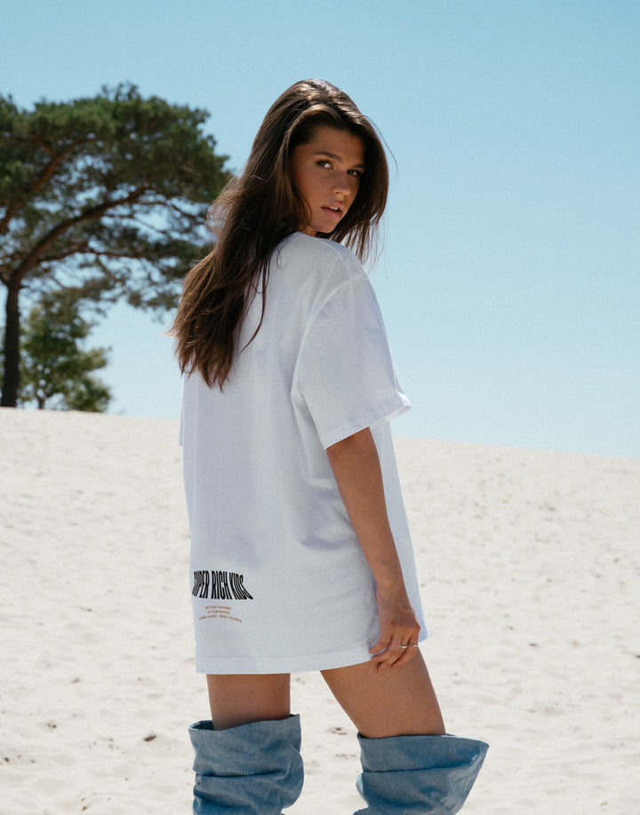 T-Shirt 'Highest in the Room' wit met geel