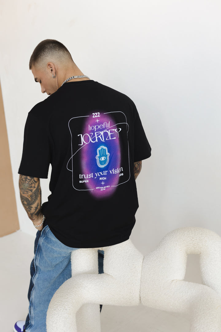 T-Shirt 'Trust your vision' Zwart